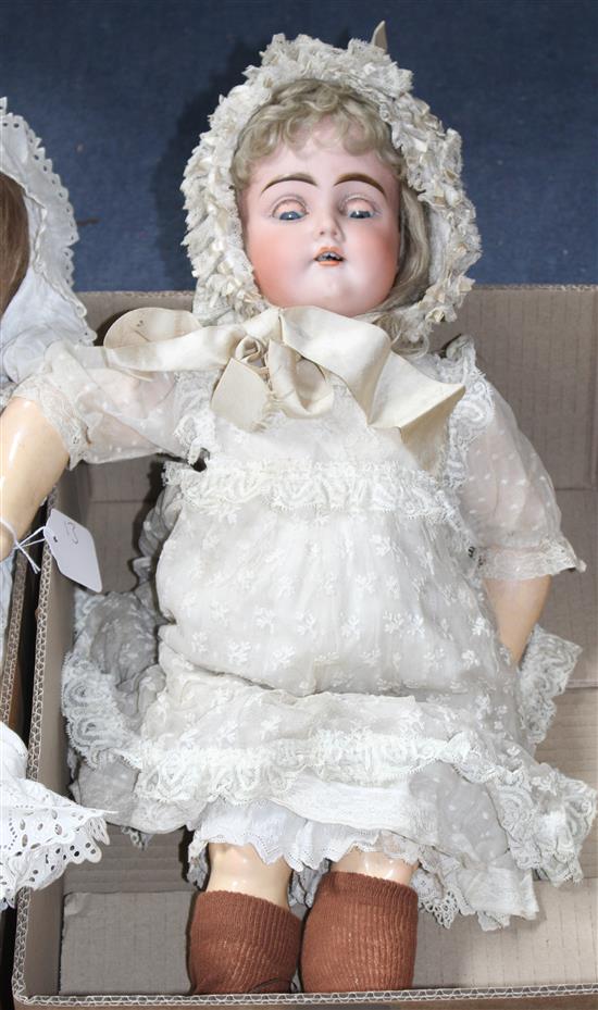 A Kestner 192 doll, fixed wrists, pierced ears and hairline to forehead, 24in.
